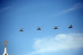 Shock-and-combat helicopters Mi-24P during the parade fly in the sky over Red Square.